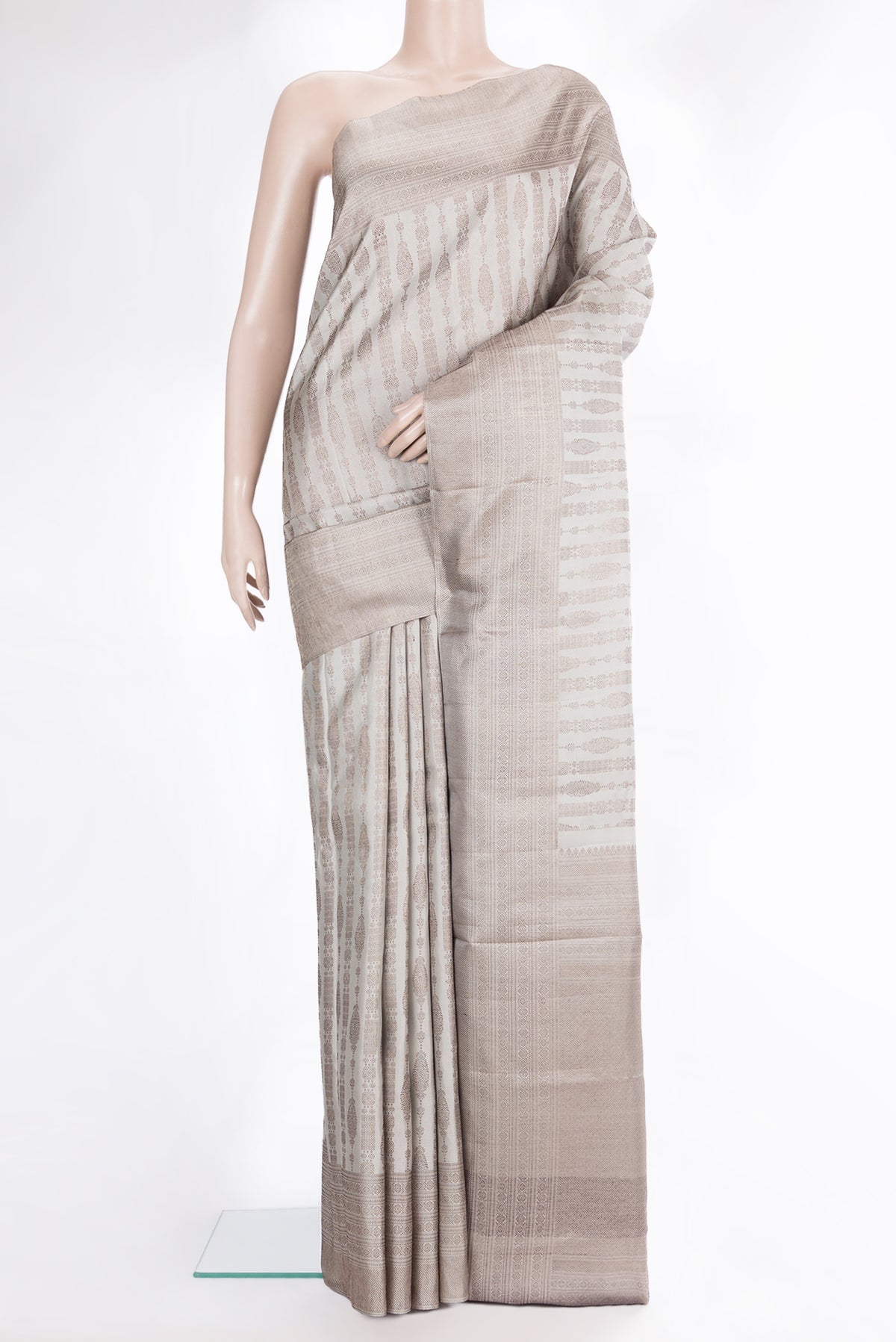 Pure Silk Grey Dual Tone Kanjivaram Saree with Zari Brocade on the body and Fancy Border.  displayed on a mannequin