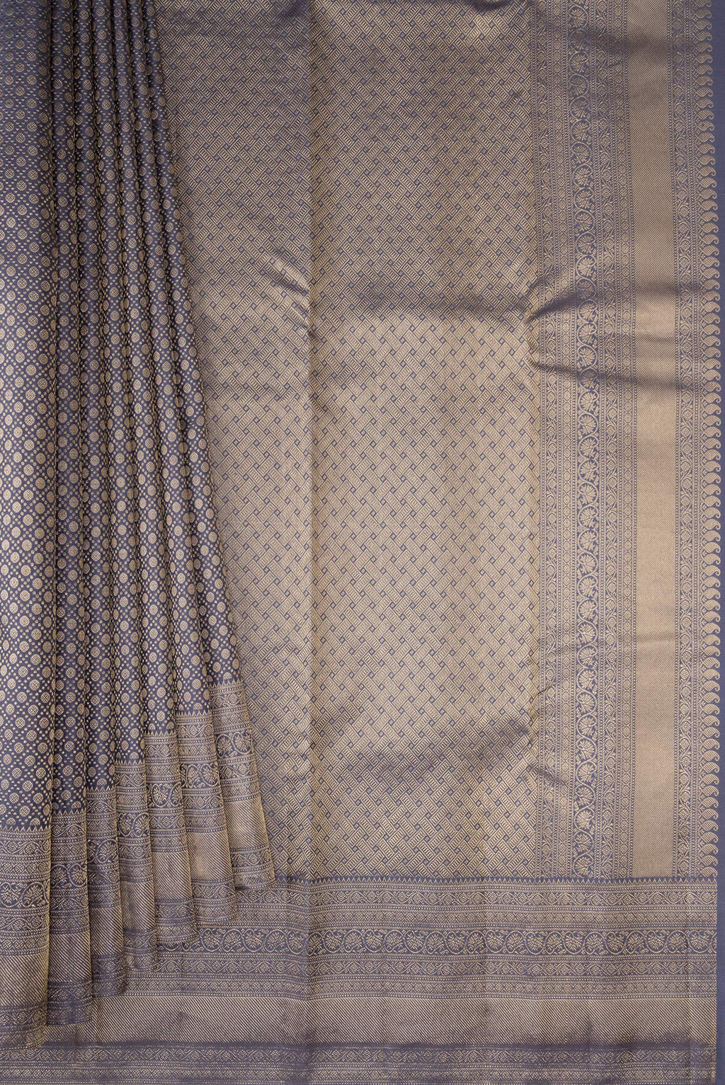 Pleats and pallu of Pure Silk Grey Kanjivaram Saree with Zari Brocade on the body and Zari Border. 