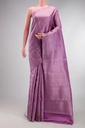 Lavender Kanjivaram Silk Saree with Zari Brocade on the body and Fancy Border.  displayed on a mannequin
