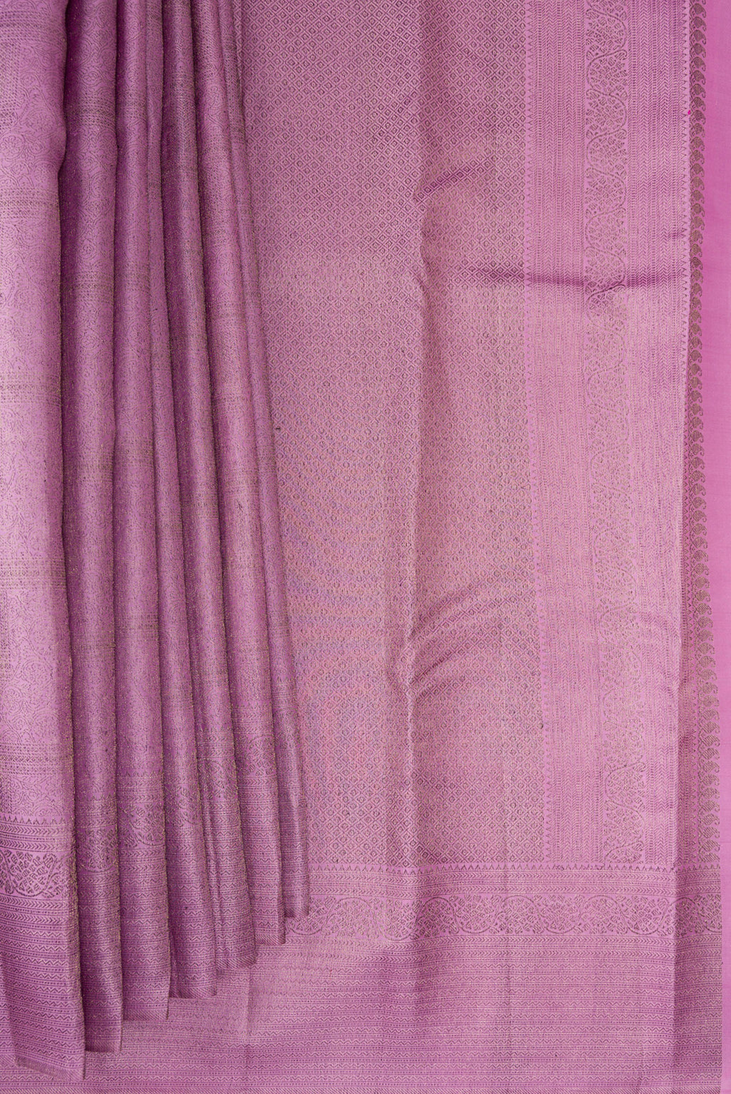Pleats and pallu of Lavender Kanjivaram Silk Saree with Zari Brocade on the body and Fancy Border. 