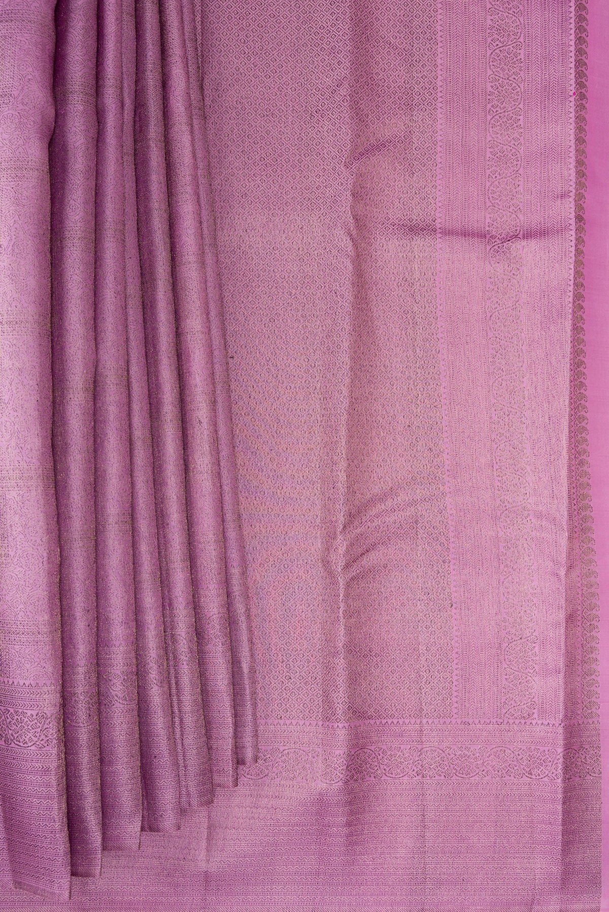 Pleats and pallu of Lavender Kanjivaram Silk Saree with Zari Brocade on the body and Fancy Border. 
