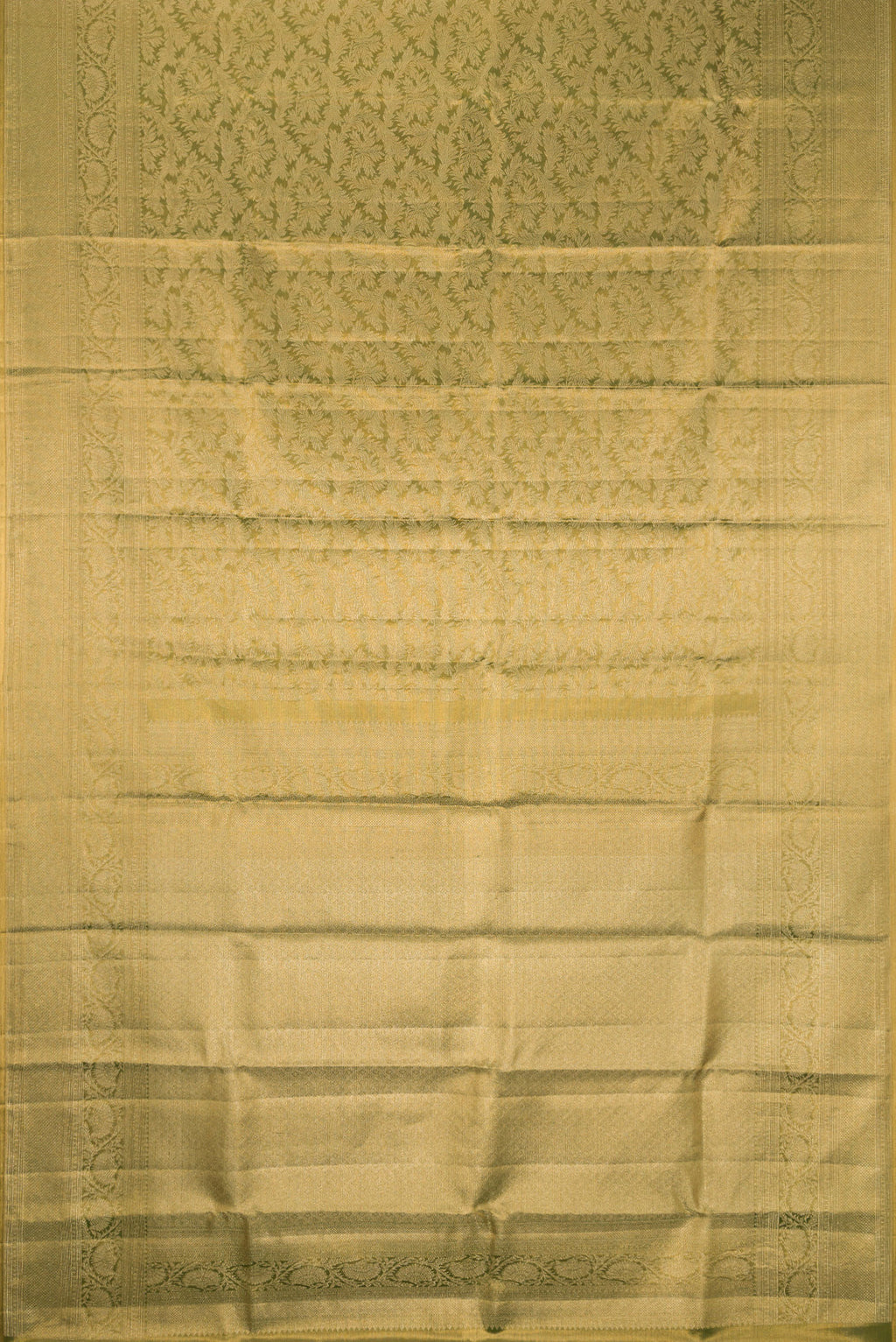 Flat view of Green Dual Tone Kanjivaram Tissue Silk Saree with Zari Brocade on the body and Fancy Border. 