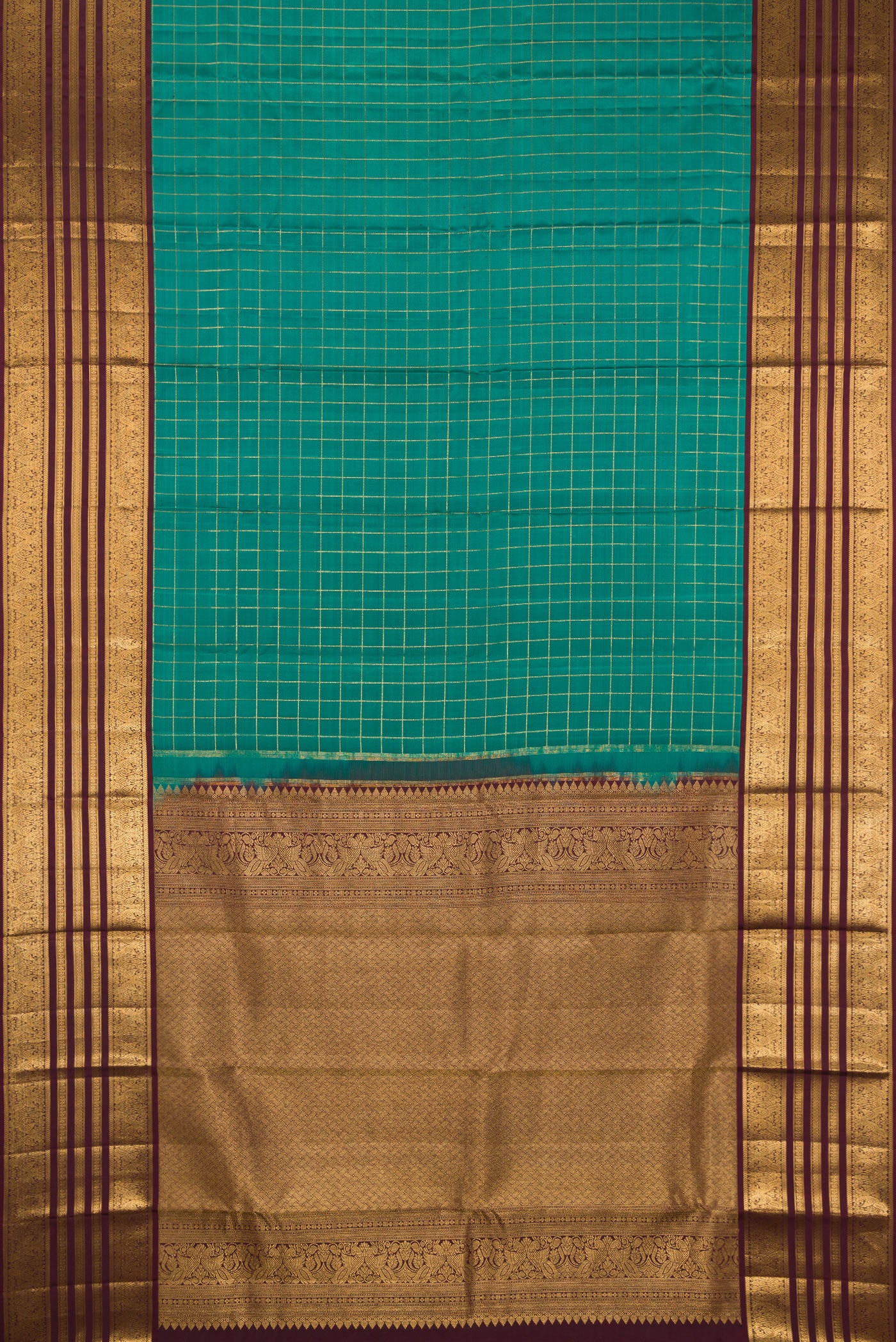 Flat view of Green Kanjivaram Silk Saree with Checked design on the body and Zari Border. 