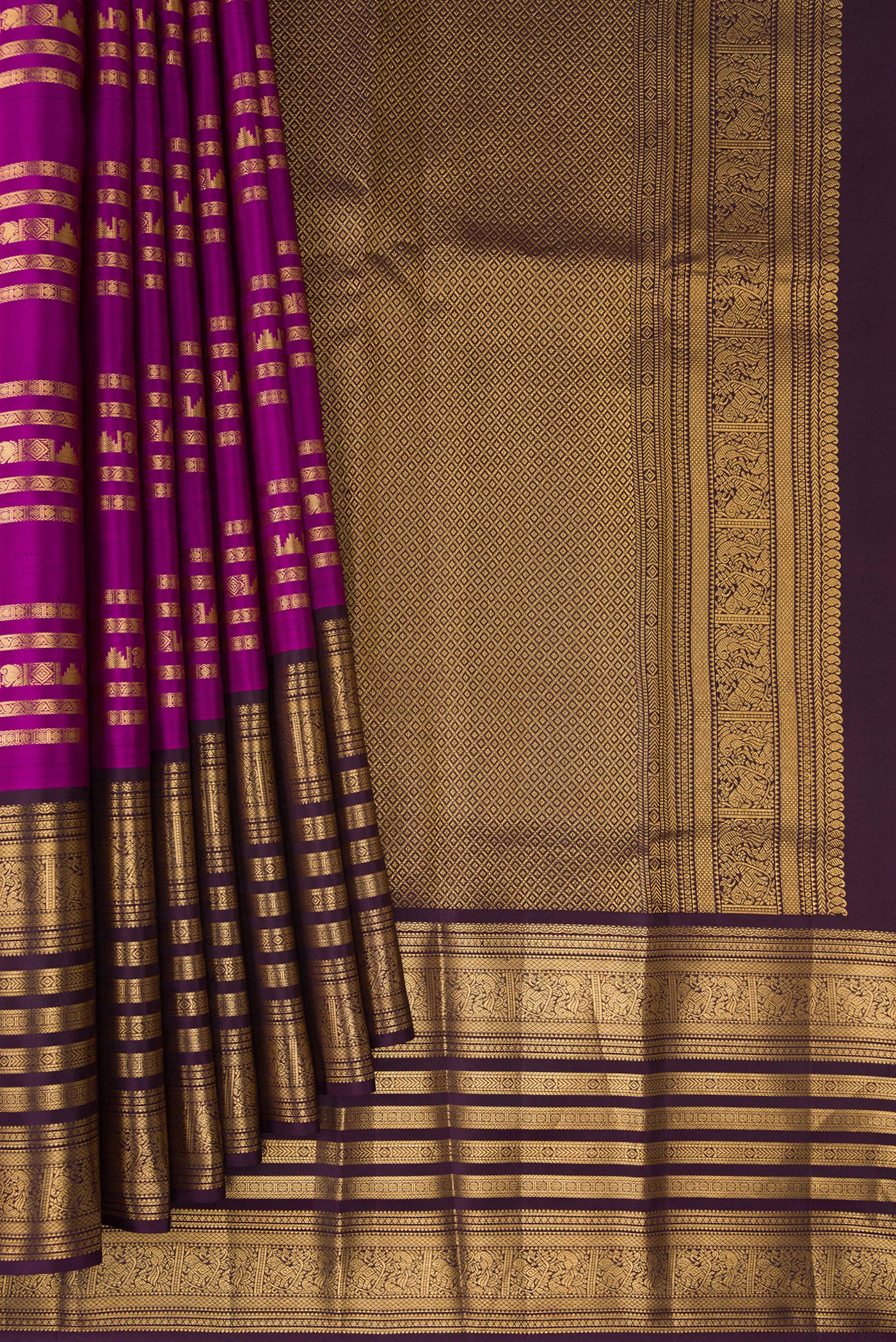 Pleats and pallu of Pure Silk Magenta Kanjivaram Saree with Stripes on the body and Fancy Border. 
