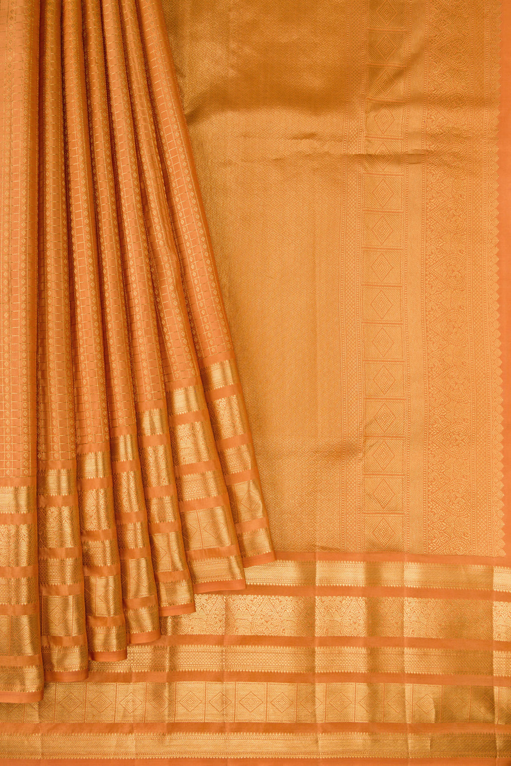 Pleats and pallu of Sandal Kanjivaram Silk Saree with Checked design on the body and Zari Border. 