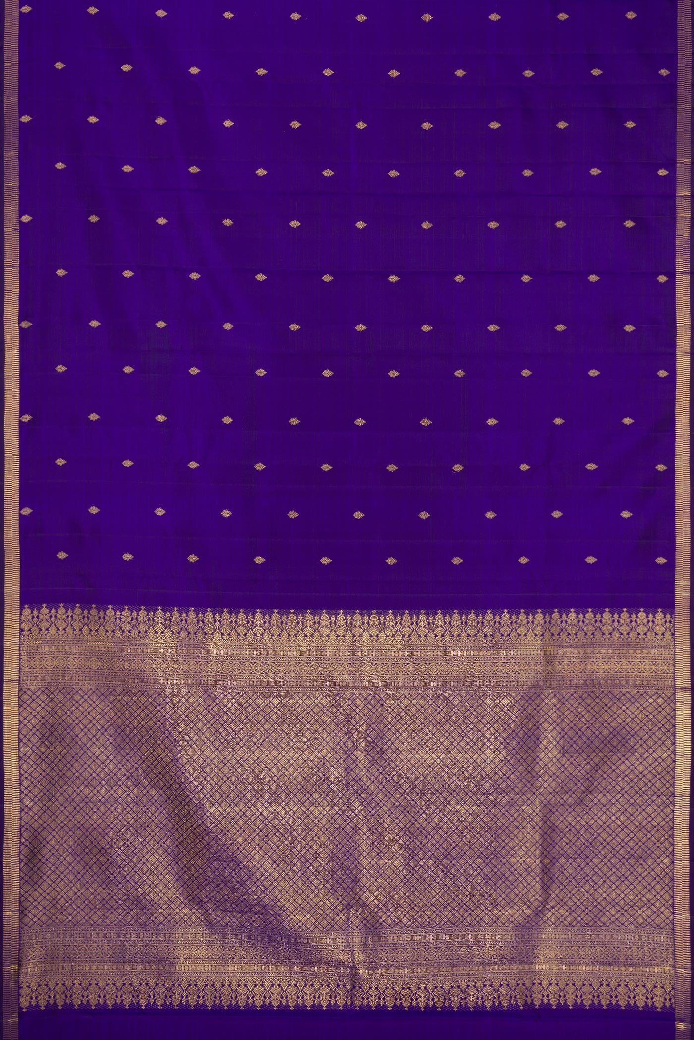 Flat view of Violet Kanjivaram Silk Saree with Zari Butta on the body and Zari Border. 