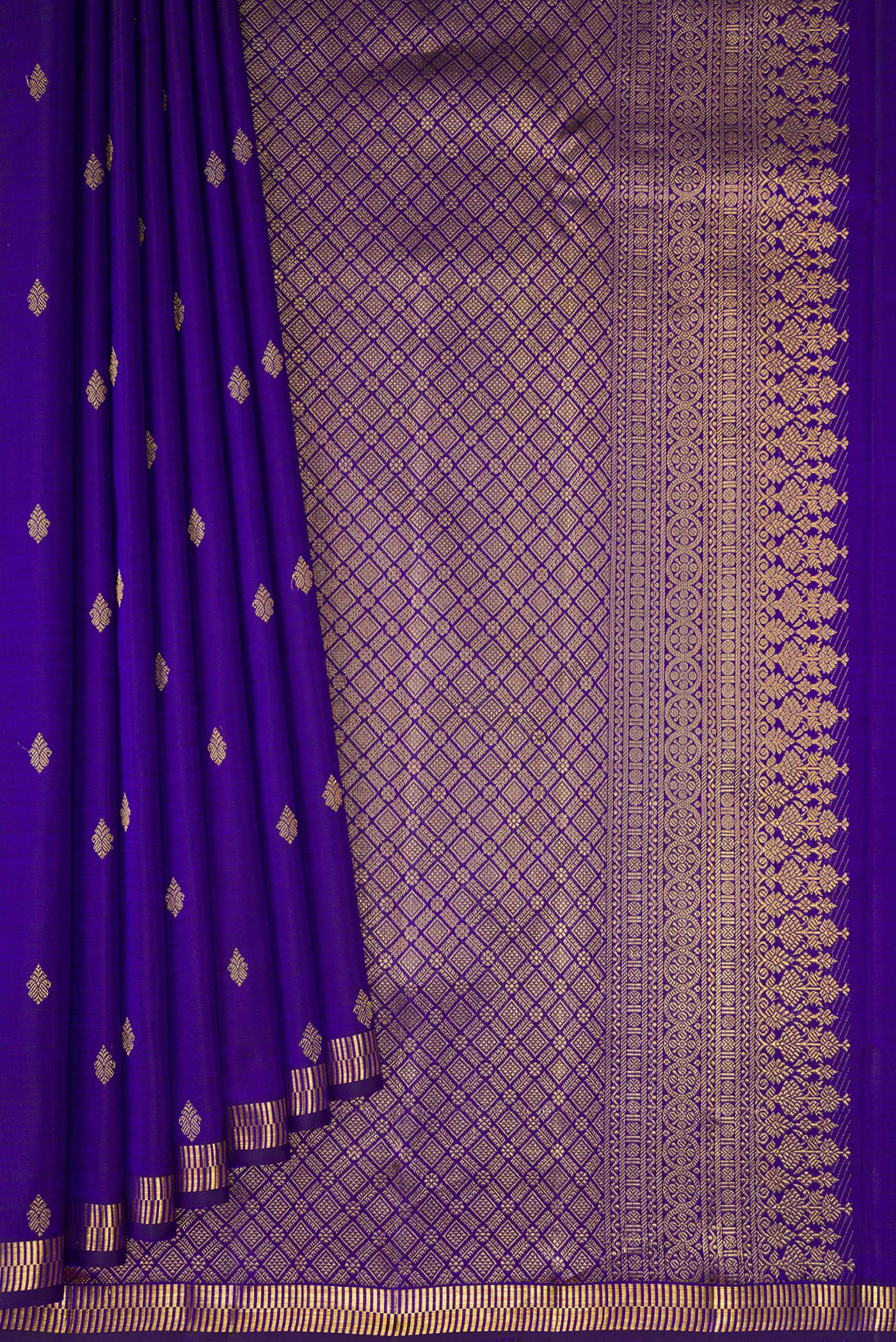 Pleats and pallu of Violet Kanjivaram Silk Saree with Zari Butta on the body and Zari Border. 