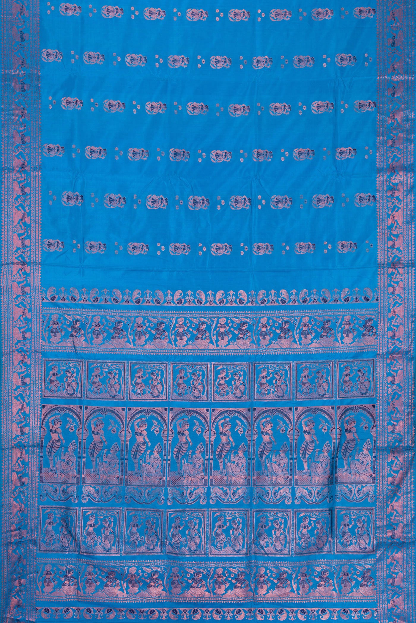 Flat view of Sky Blue Dual Tone Baluchari Silk Saree with Zari And Thread Butta on the body and Fancy Border. 