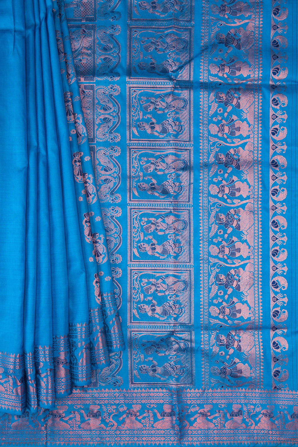 Pleats and pallu of Sky Blue Dual Tone Baluchari Silk Saree with Zari And Thread Butta on the body and Fancy Border. 
