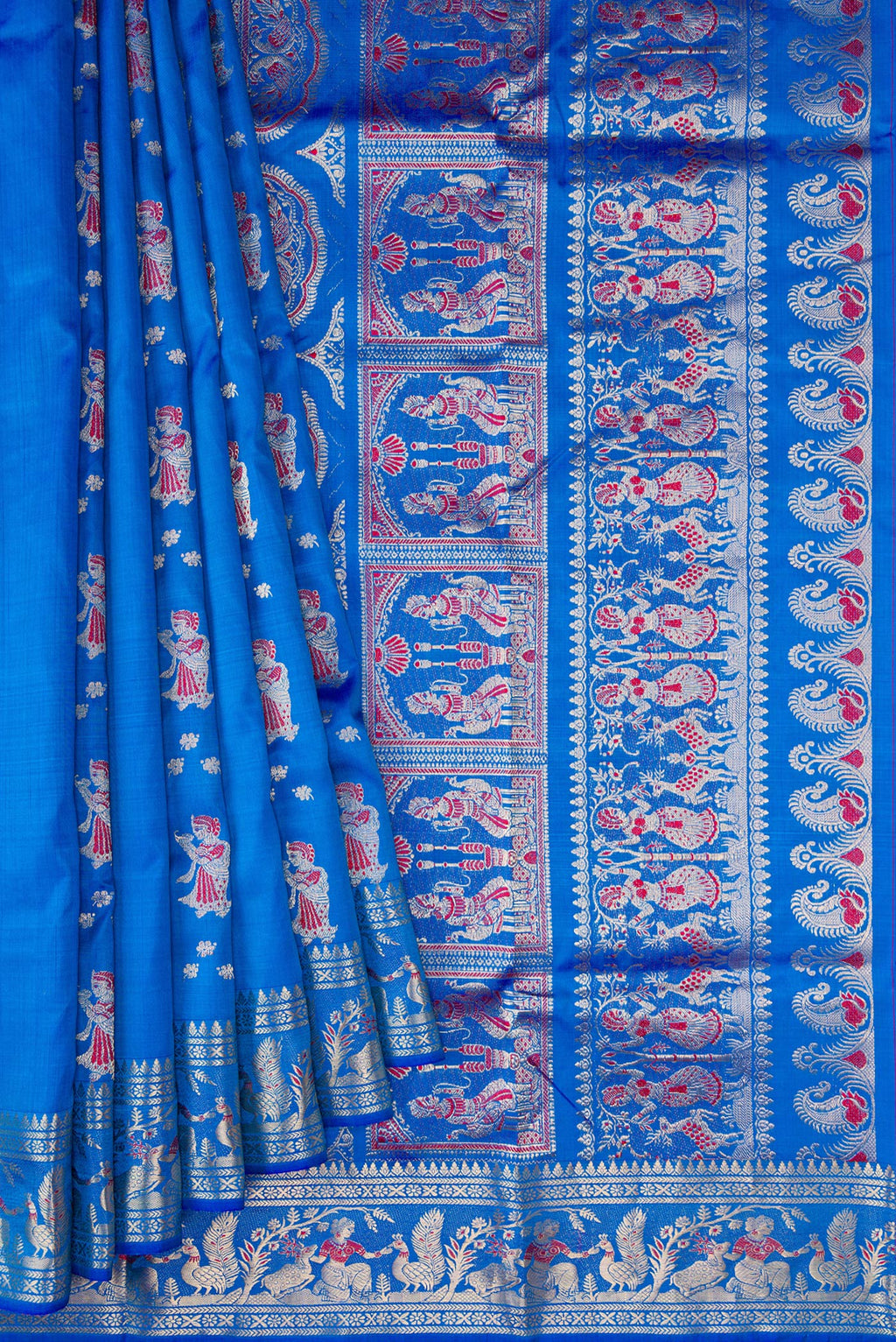 Pleats and pallu of Royal Blue Dual Tone Baluchari Silk Saree with Zari And Thread Butta on the body and Fancy Border. 