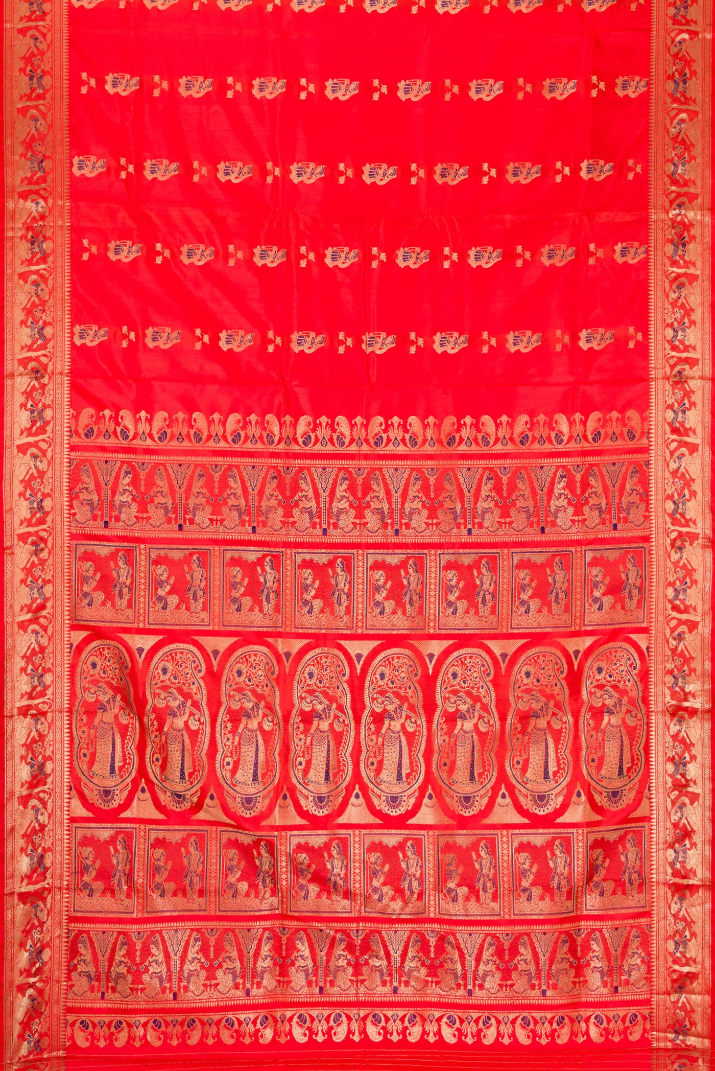 Flat view of Orange Baluchari Silk Saree with Zari And Thread Butta on the body and Fancy Border. 