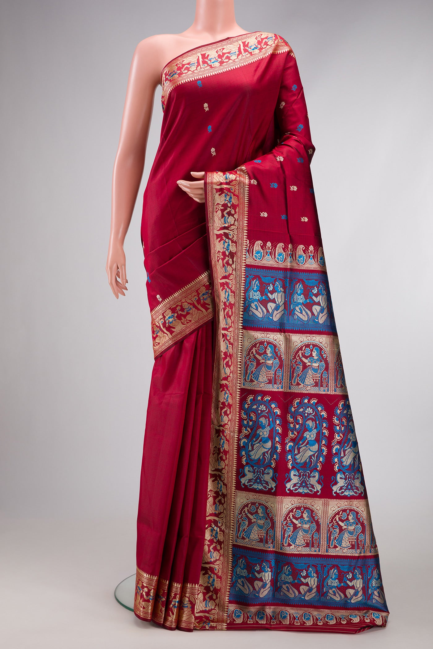 Maroon Dual Tone Baluchari Silk Saree with Thread Butta on the body and Thread Border.  displayed on a mannequin