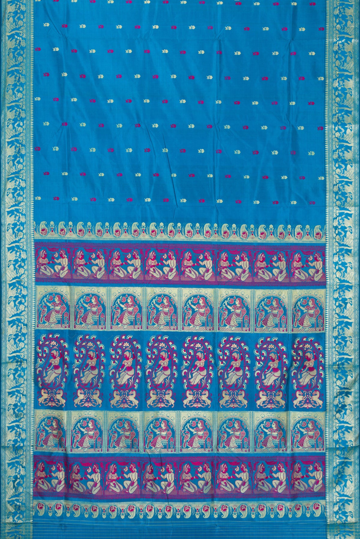 Flat view of Sky Blue Baluchari Silk Saree with Thread Butta on the body and Thread Border. 