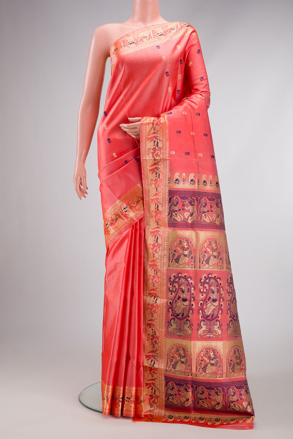 Peach Baluchari Silk Saree with Thread Butta on the body and Thread Border.  displayed on a mannequin