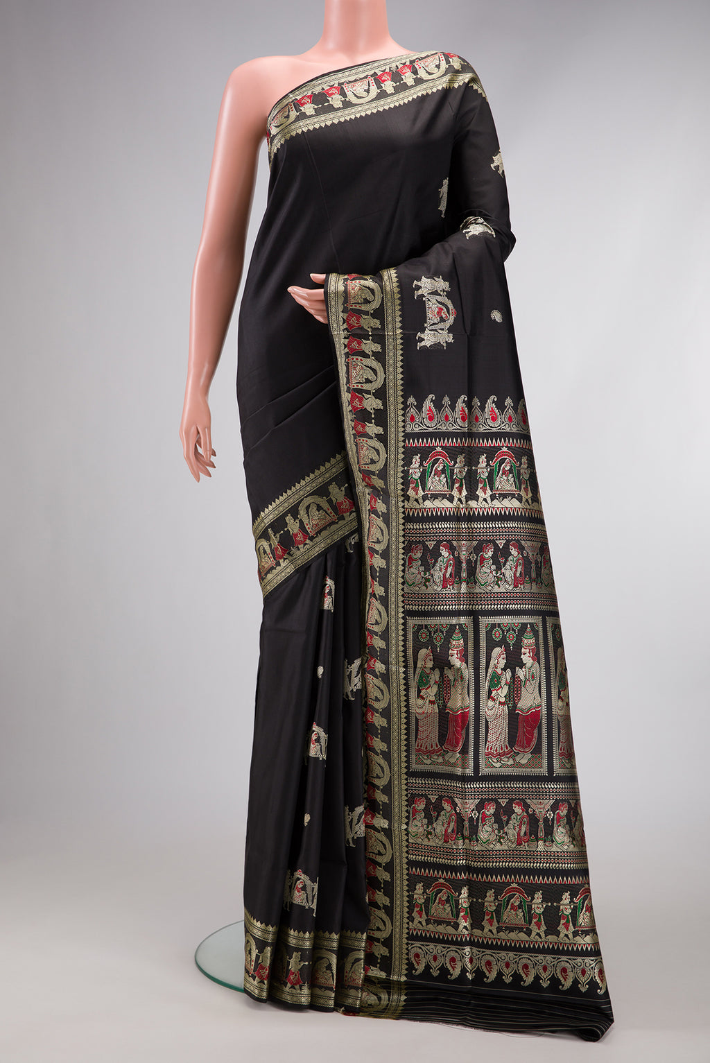 Black Baluchari Silk Saree with Thread Butta on the body and Thread Border.  displayed on a mannequin