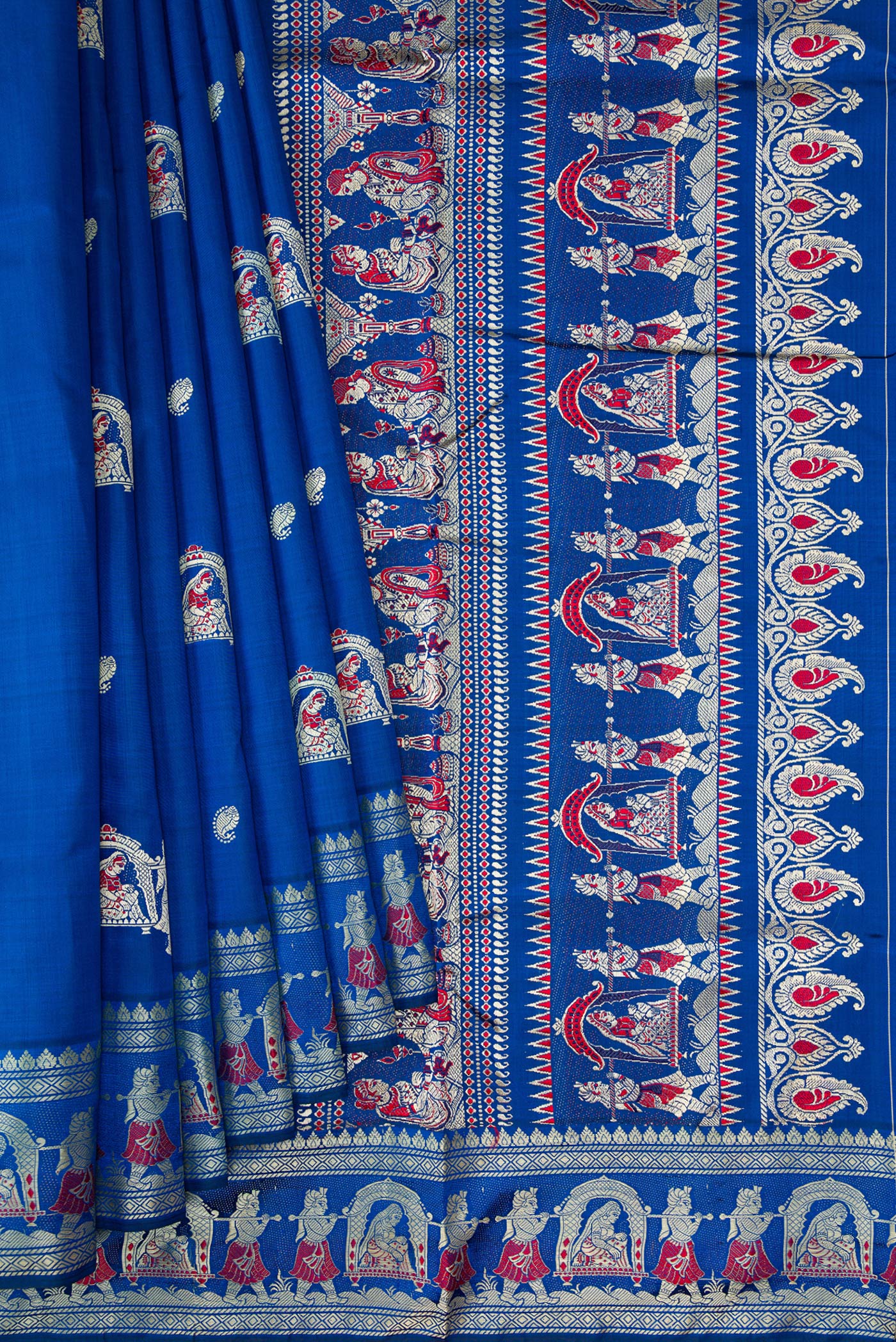 Pleats and pallu of Royal Blue Dual Tone Baluchari Silk Saree with Thread Butta on the body and Thread Border. 