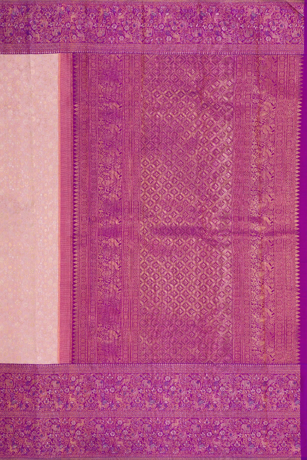 Close up image of the pallu of Rose Gold Kanjivaram Silk Saree with Zari Brocade on the body and Fancy Border. 