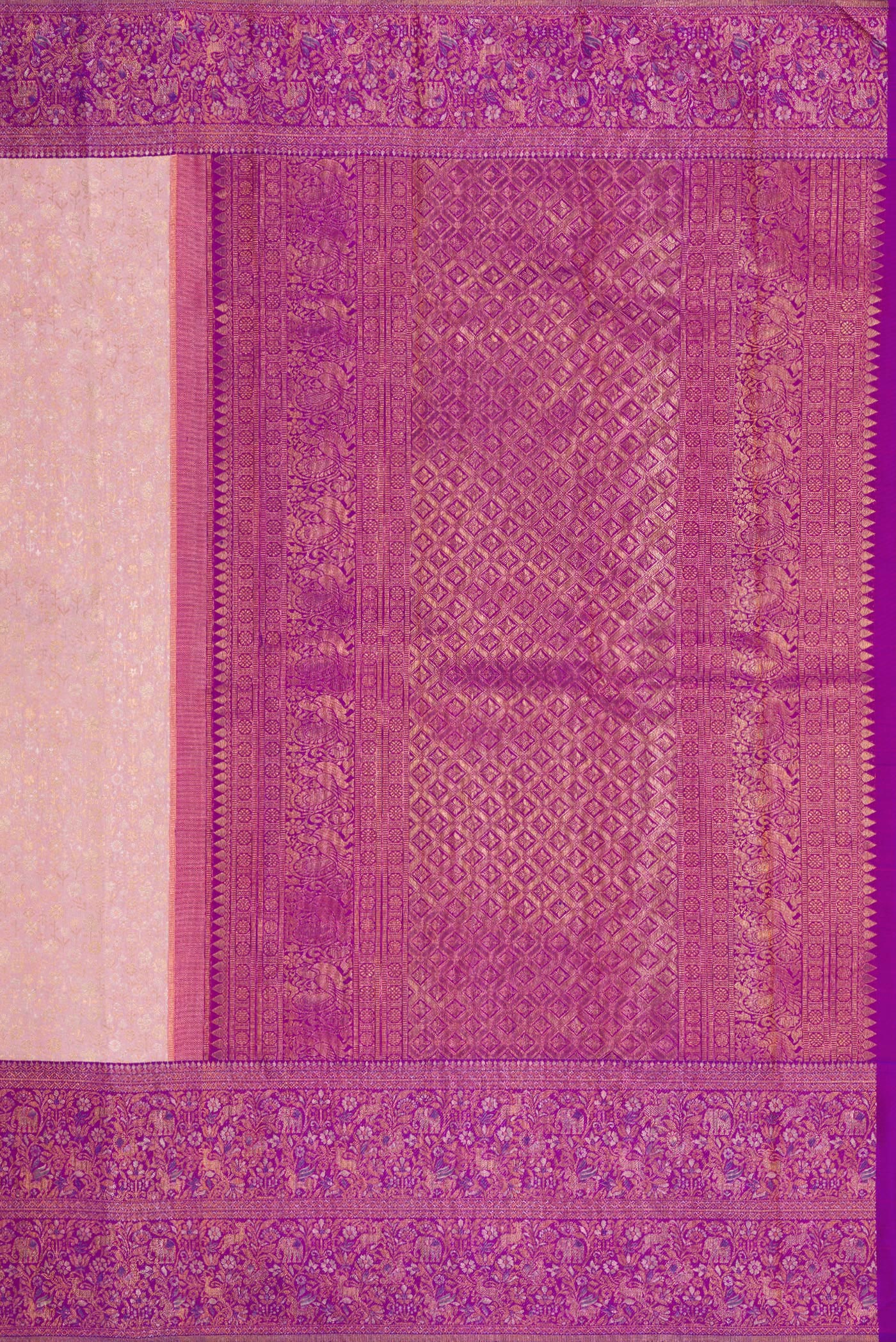 Close up image of the pallu of Rose Gold Kanjivaram Silk Saree with Zari Brocade on the body and Fancy Border. 