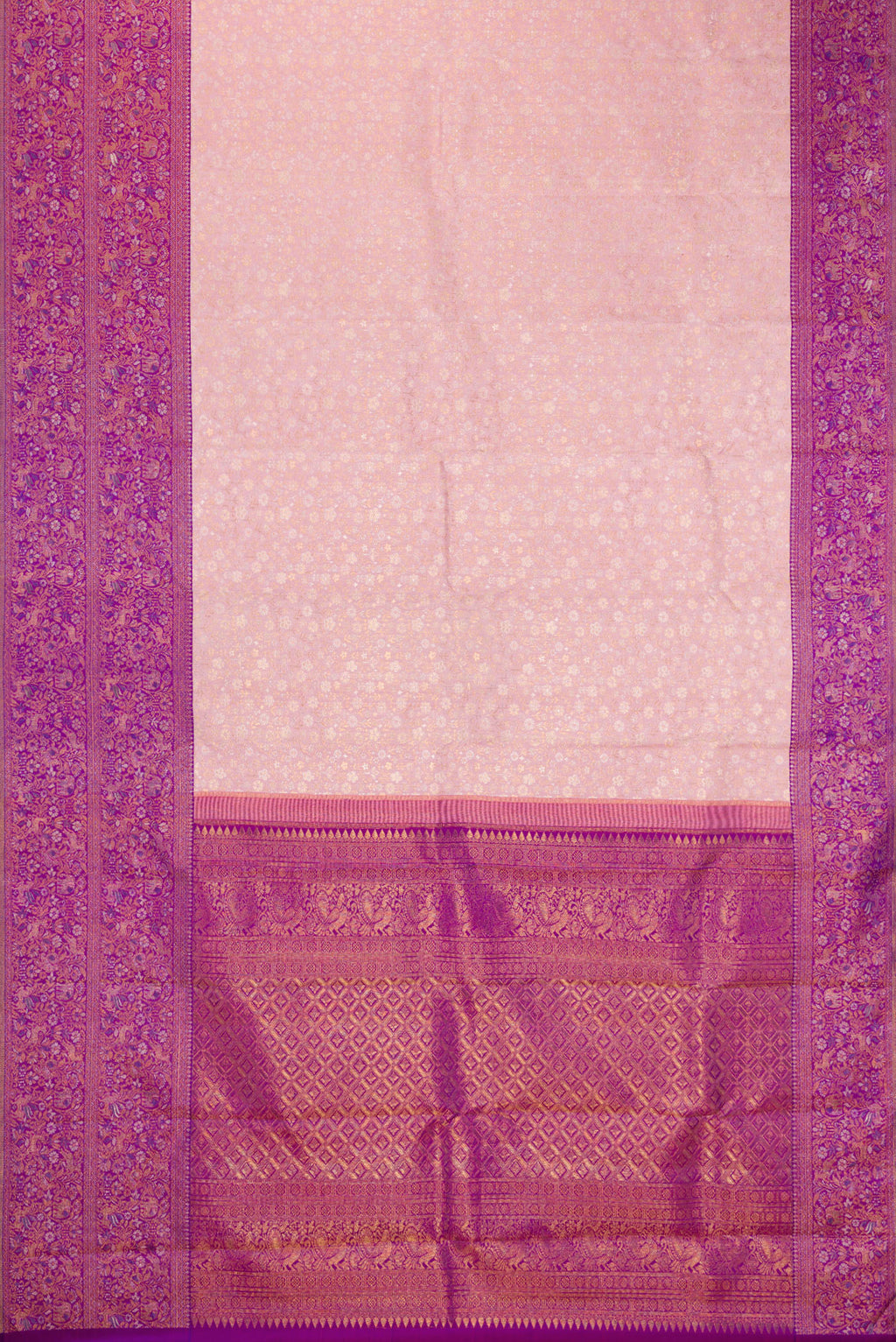 Flat view of Rose Gold Kanjivaram Silk Saree with Zari Brocade on the body and Fancy Border. 