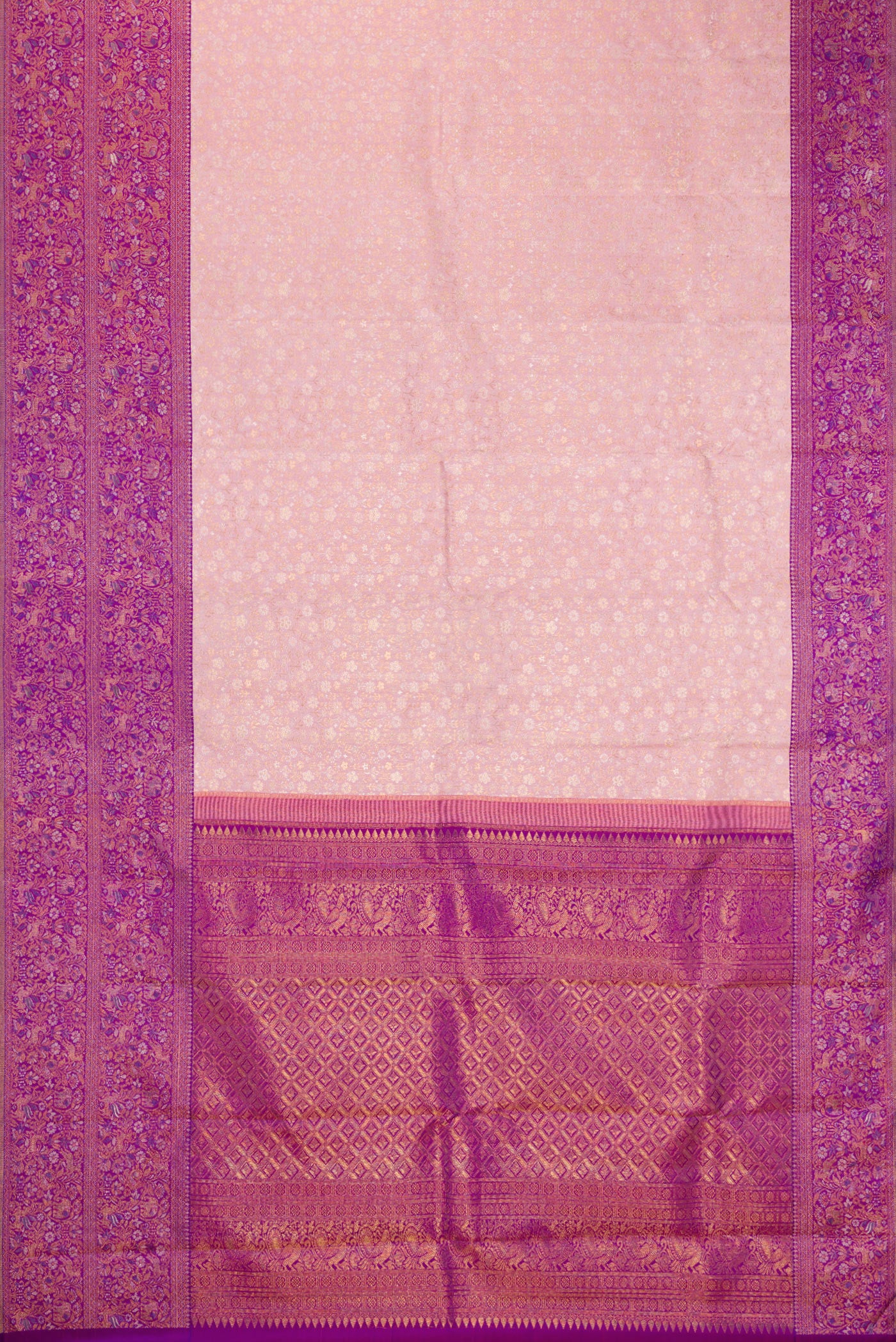 Flat view of Rose Gold Kanjivaram Silk Saree with Zari Brocade on the body and Fancy Border. 