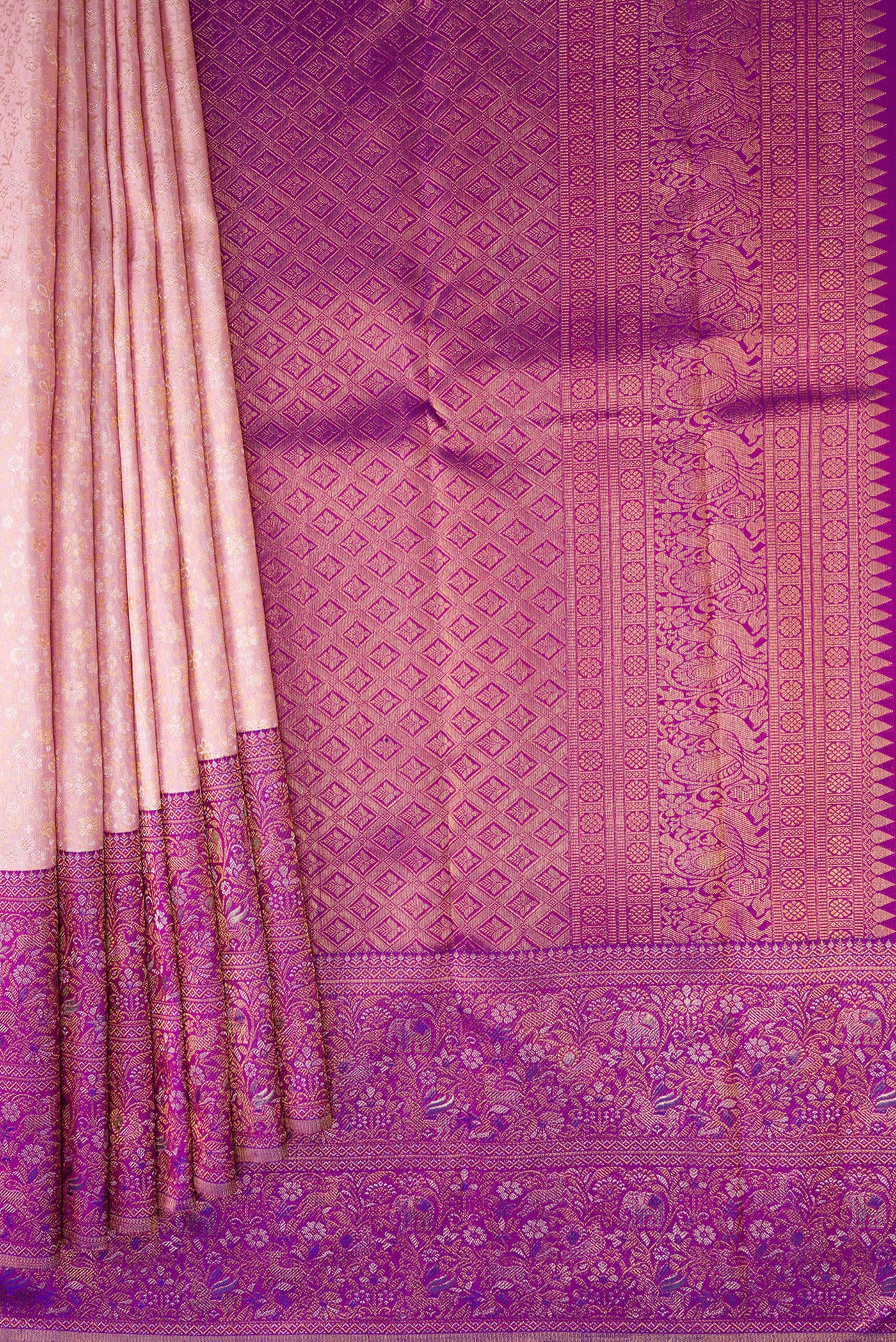 Pleats and pallu of Rose Gold Kanjivaram Silk Saree with Zari Brocade on the body and Fancy Border. 