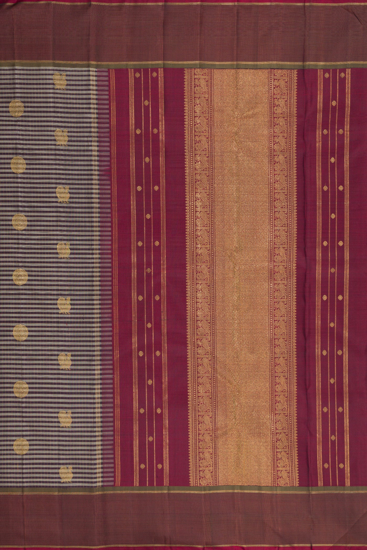 Close up image of the pallu of Pure Silk Pure Zari Grey Kanjivaram Saree with Checked design on the body and Zari Border. 