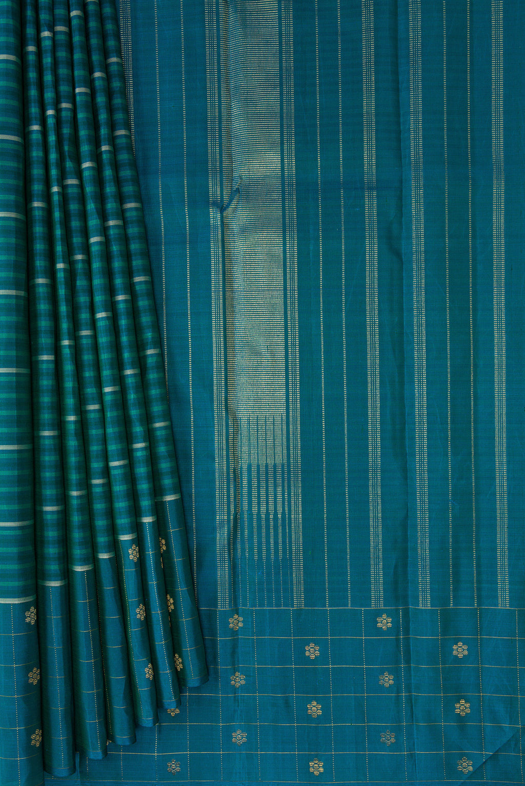 Pleats and pallu of Peacock Blue Kanjivaram Silk Saree with Stripes on the body and Fancy Border. 
