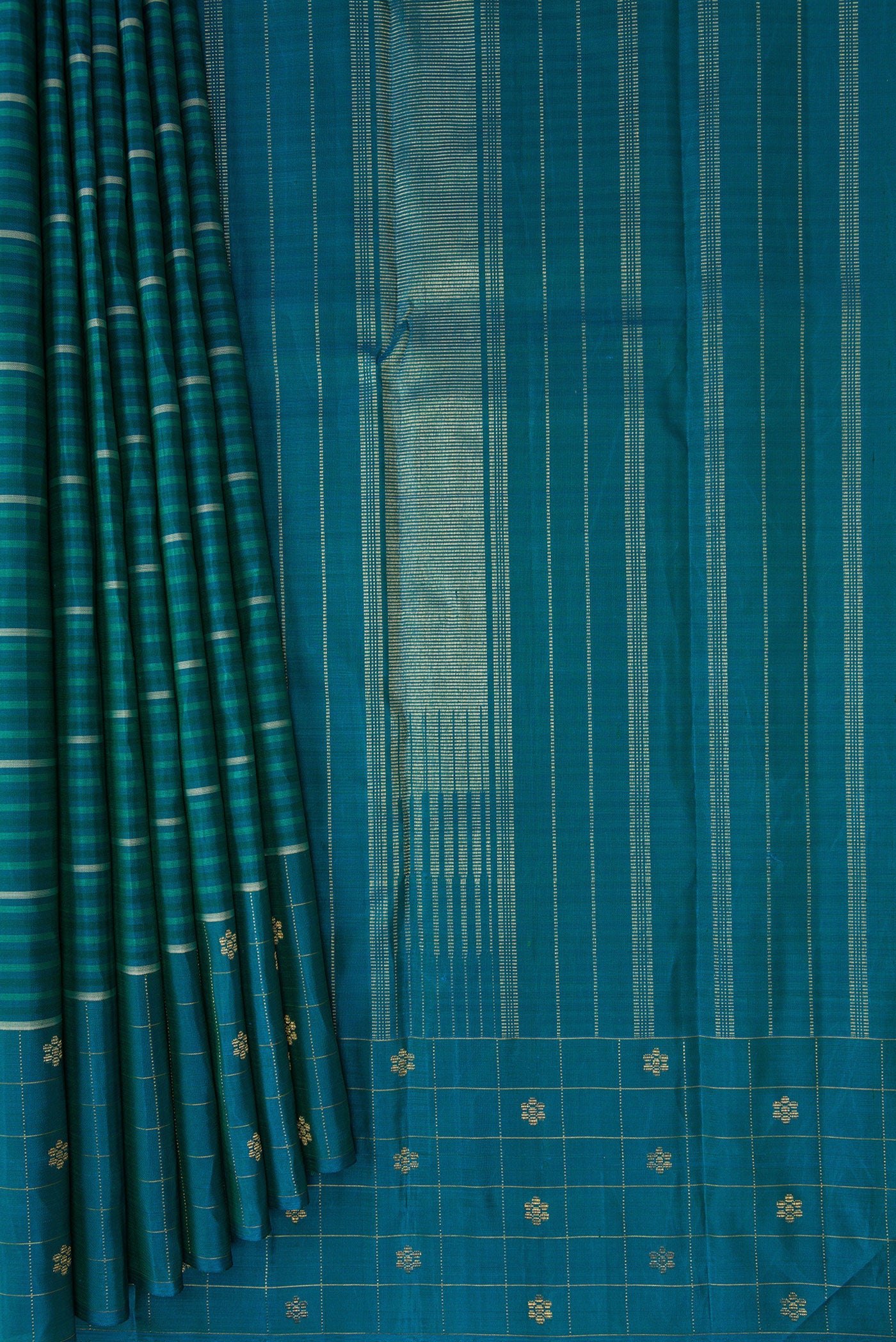 Pleats and pallu of Peacock Blue Kanjivaram Silk Saree with Stripes on the body and Fancy Border. 