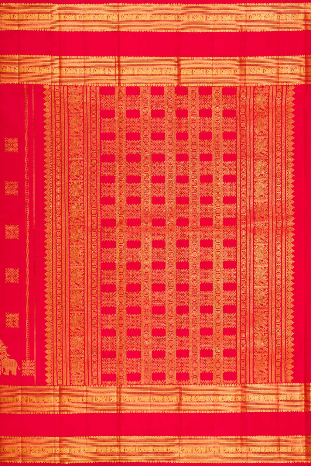 Close up image of the pallu of Red Kanjivaram Silk Saree with Zari Butta on the body and Zari Border. 