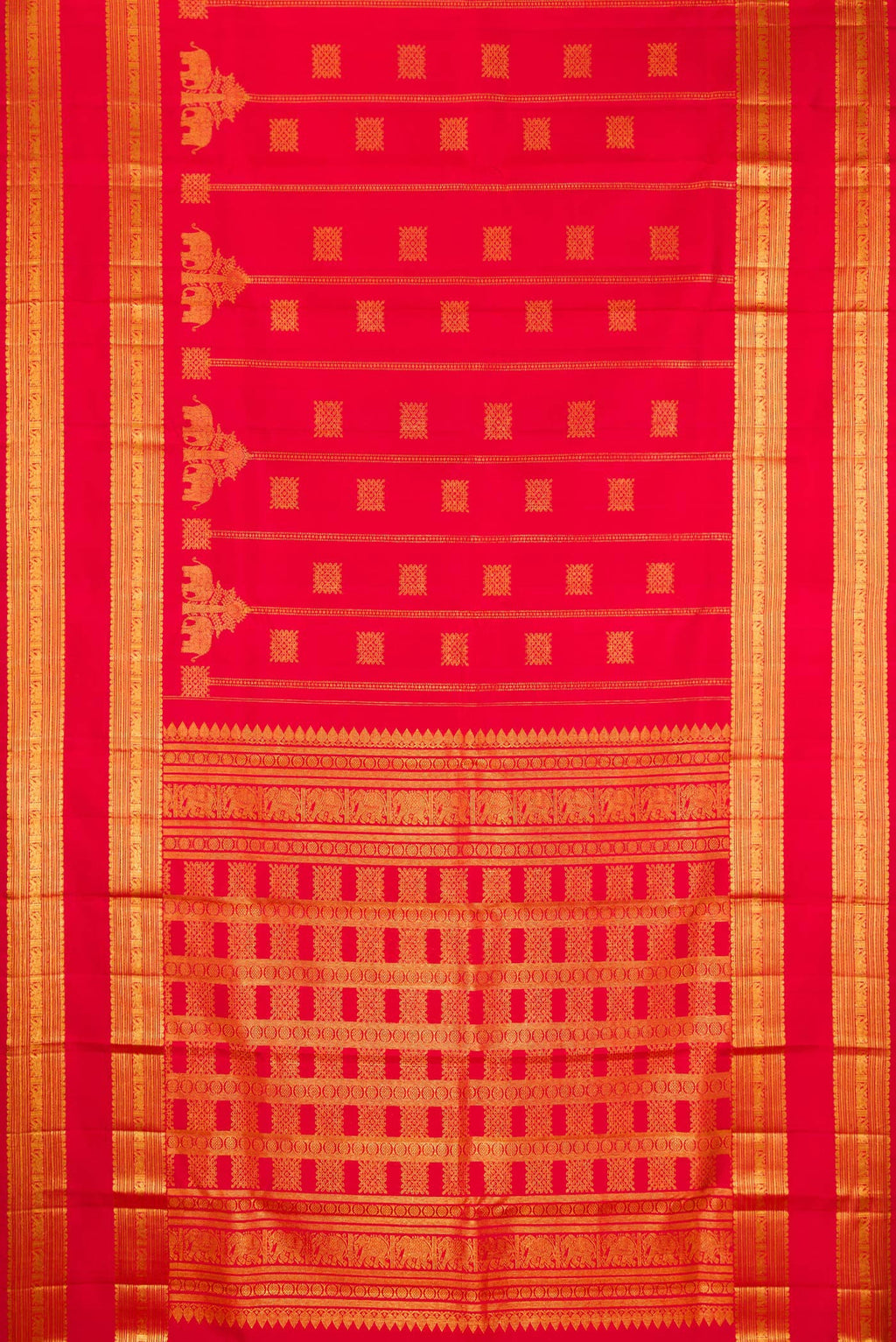 Flat view of Red Kanjivaram Silk Saree with Zari Butta on the body and Zari Border. 