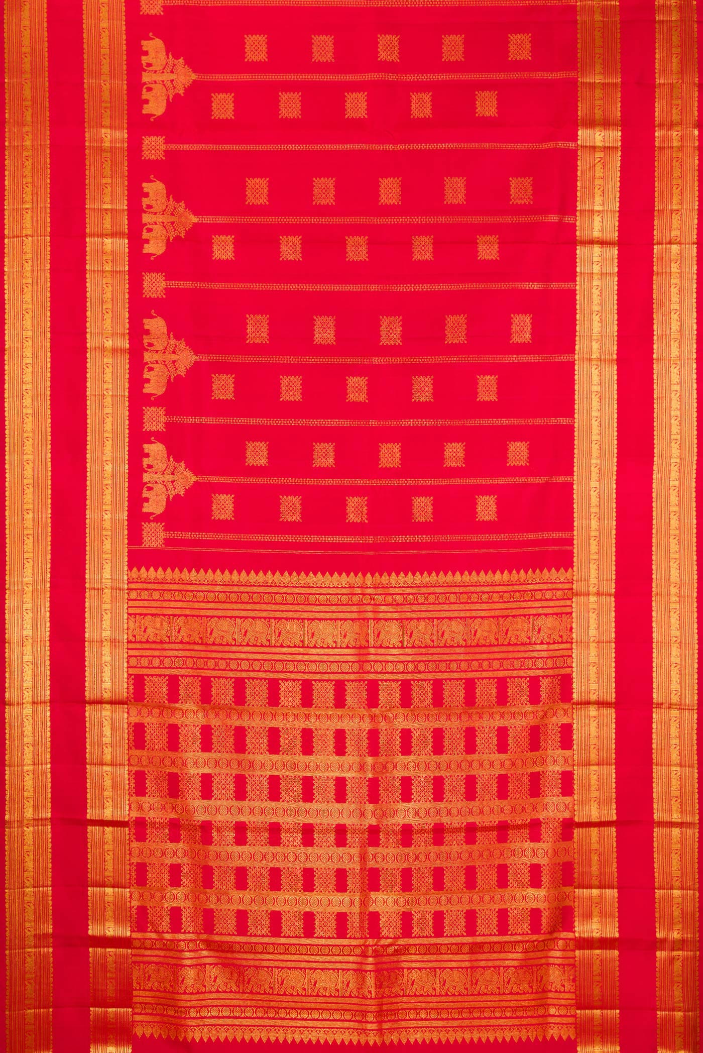 Flat view of Red Kanjivaram Silk Saree with Zari Butta on the body and Zari Border. 