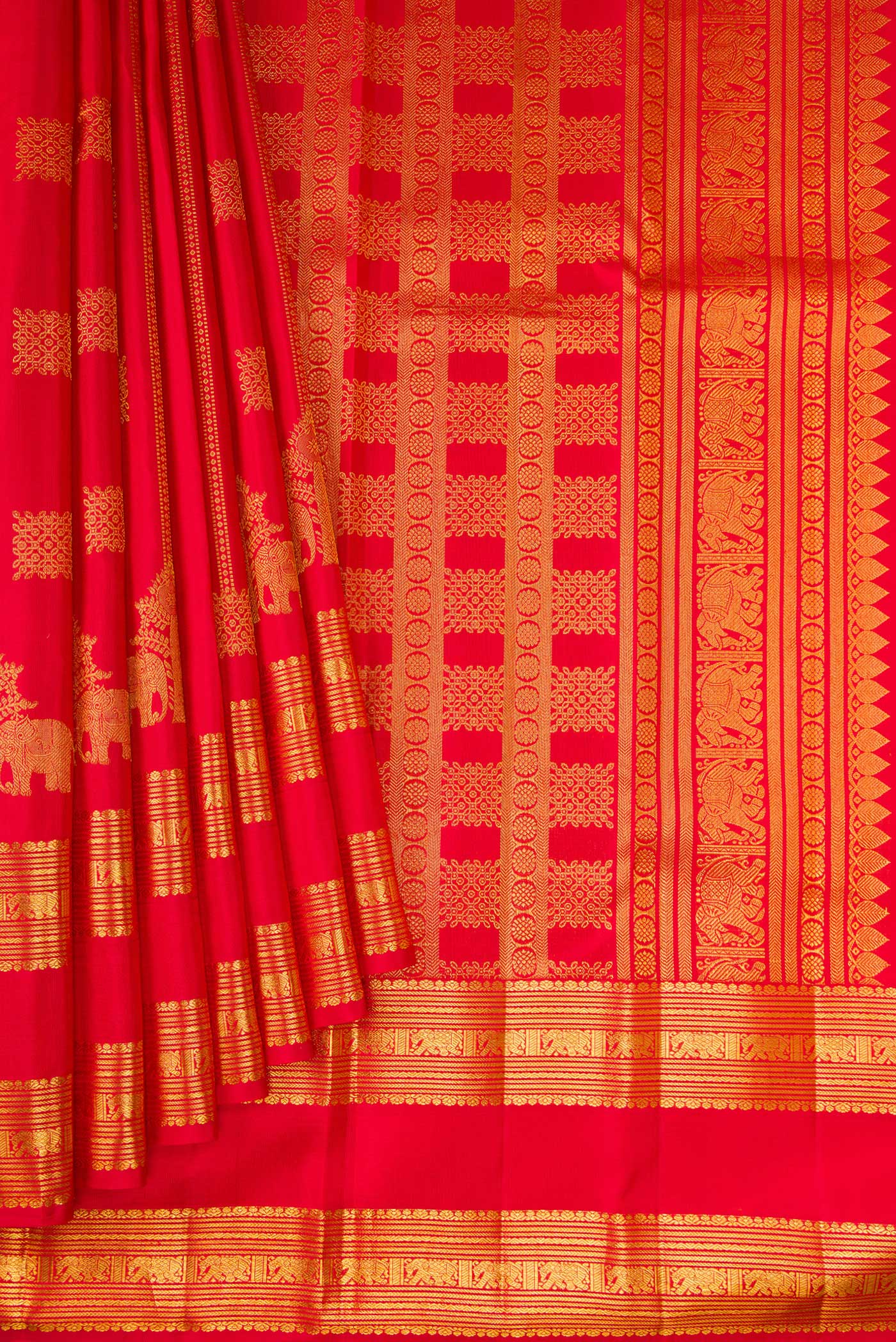 Pleats and pallu of Red Kanjivaram Silk Saree with Zari Butta on the body and Zari Border. 