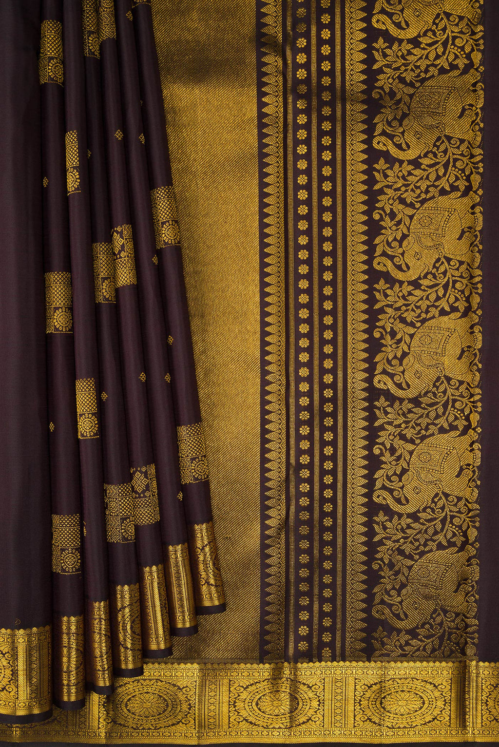 Pleats and pallu of Coffee Brown Kanjivaram Silk Saree with Zari Butta on the body and Zari Border. 