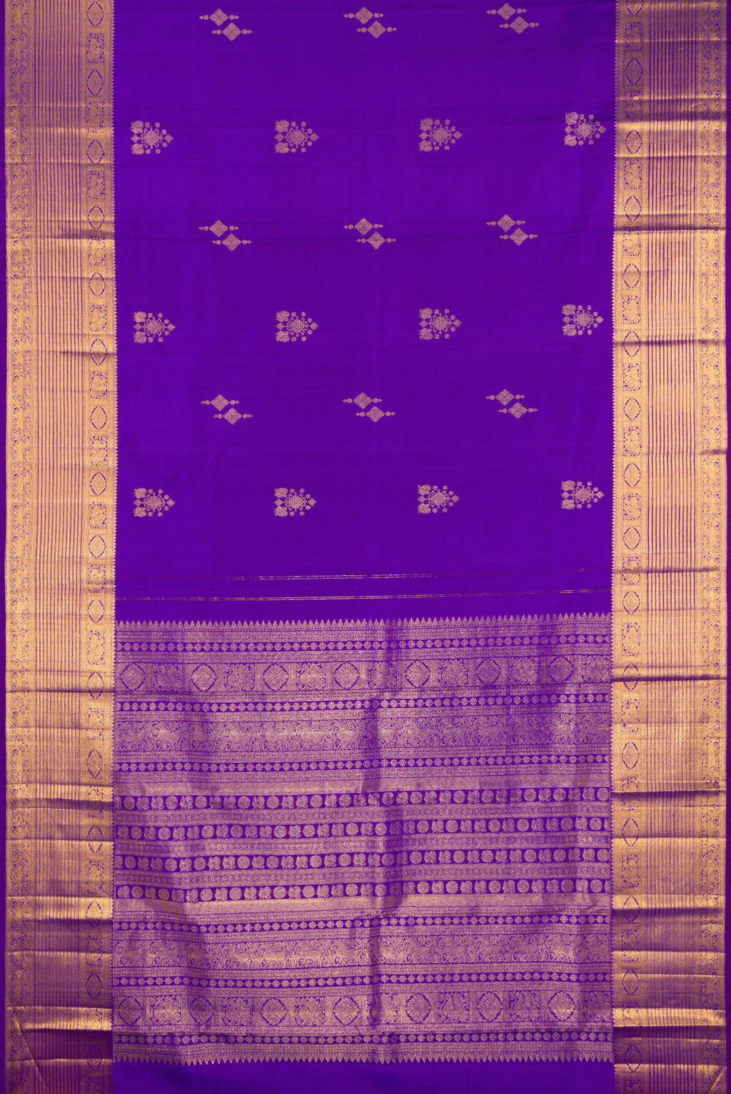 Flat view of Pure Silk Violet Kanjivaram Saree with Zari Butta on the body and Zari Border. 