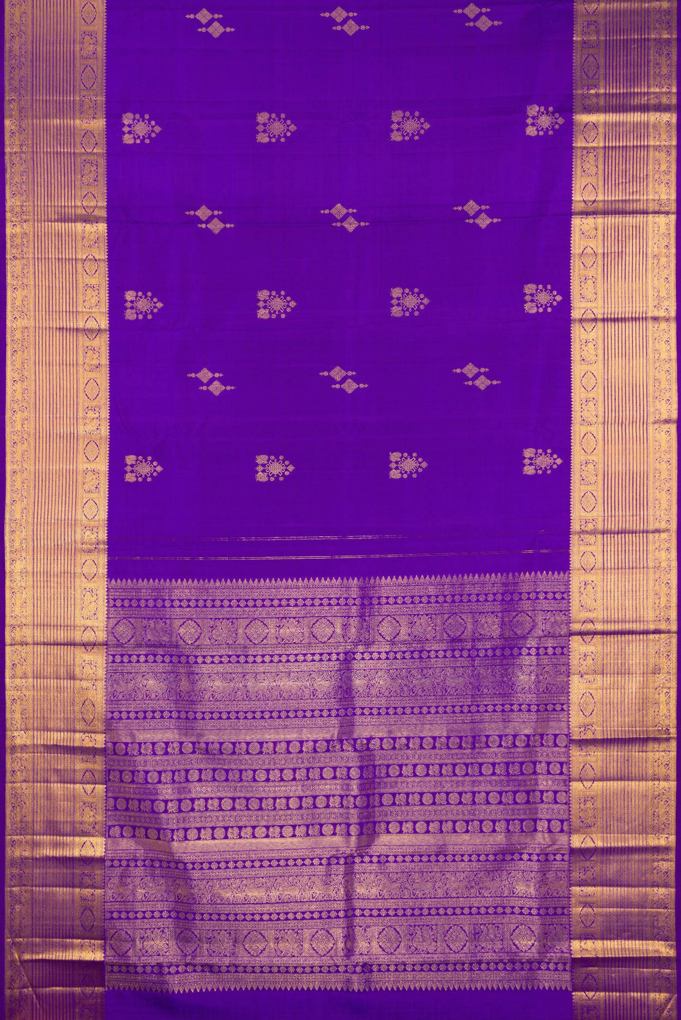 Flat view of Pure Silk Violet Kanjivaram Saree with Zari Butta on the body and Zari Border. 