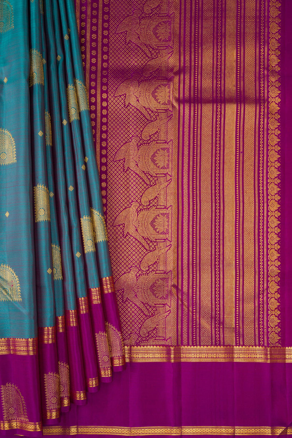 Pleats and pallu of Maya Blue Dual Tone Kanjivaram Silk Saree with Zari Butta on the body and Zari Border. 