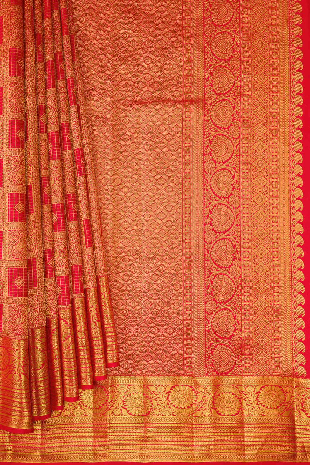 Pleats and pallu of Red Kanchipuram Silk Saree with Zari Brocade on the body and Zari Border. 