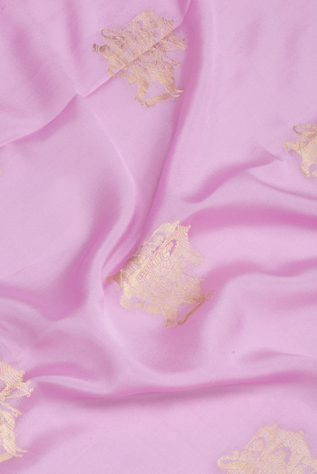Close up of Lavender Mysore Silk Saree with Zari Butta on the body and Zari Border.  displaying folds