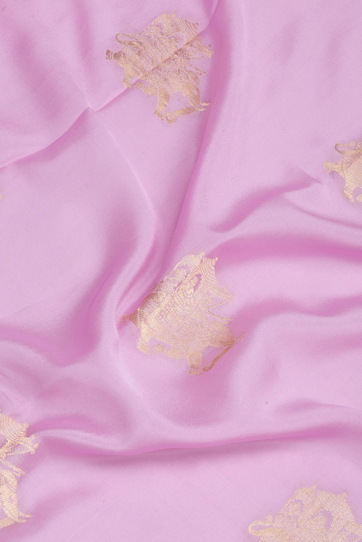 Close up of Lavender Mysore Silk Saree with Zari Butta on the body and Zari Border.  displaying folds