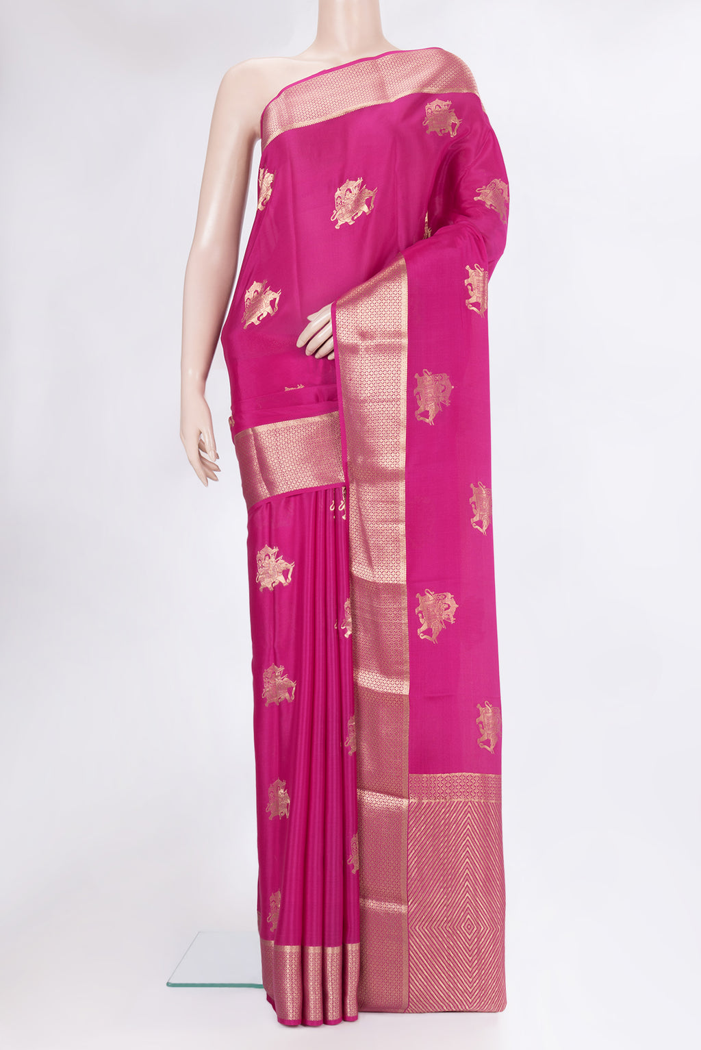 Dark Pink Mysore Silk Saree with Zari Butta on the body and Zari Border.  displayed on a mannequin