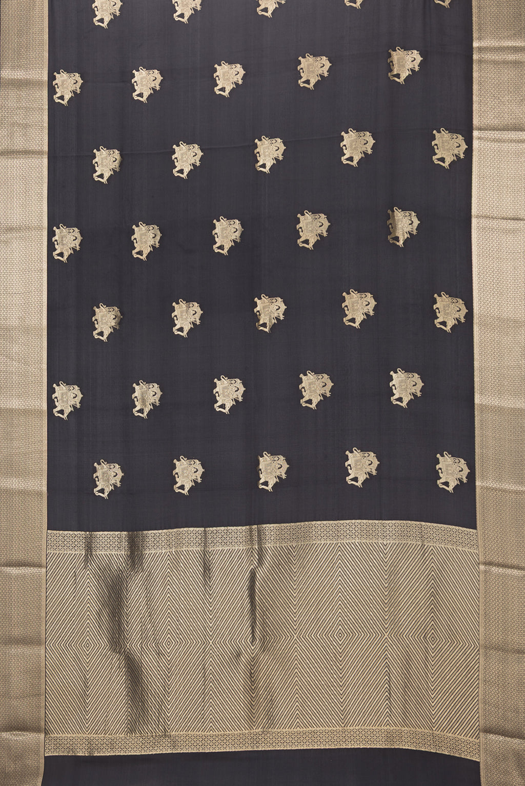 Flat view of Black Mysore Silk Saree with Zari Butta on the body and Zari Border. 