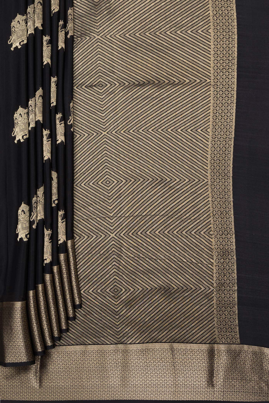 Pleats and pallu of Black Mysore Silk Saree with Zari Butta on the body and Zari Border. 