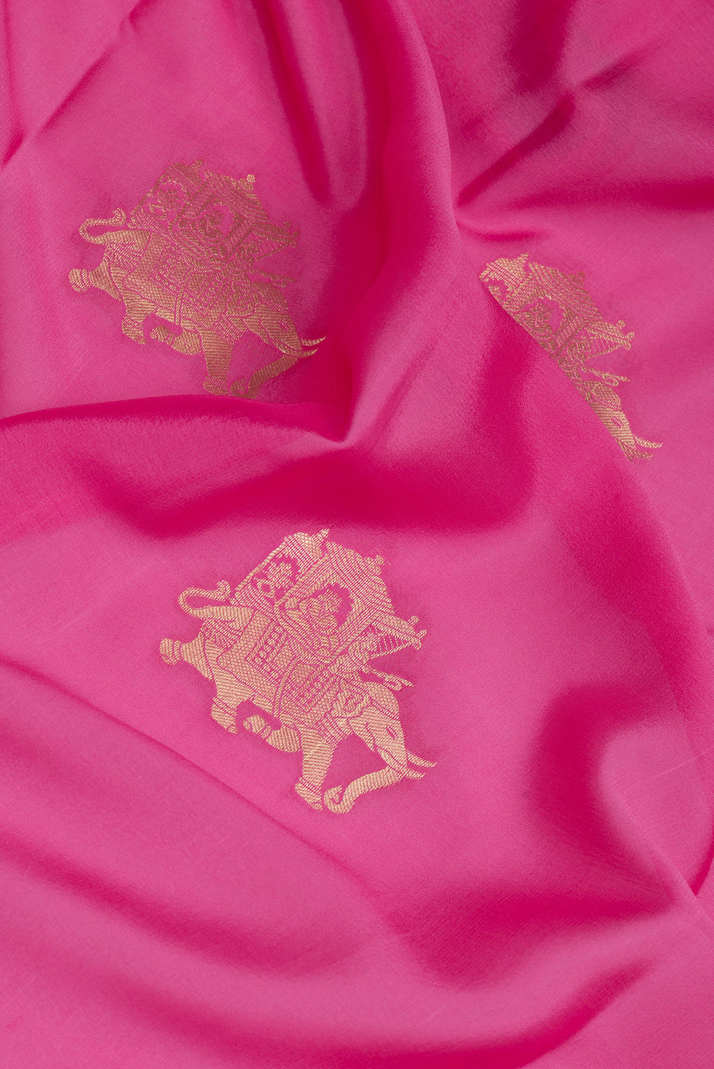 Close up of Pink Mysore Silk Saree with Zari Butta on the body and Zari Border.  displaying folds