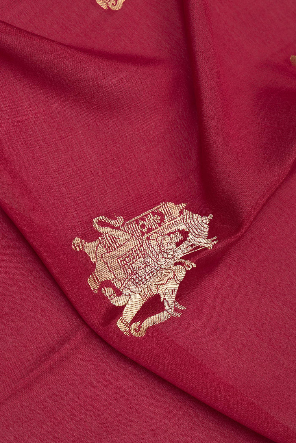 Close up of Maroon Mysore Crepe Saree with Zari Butta on the body and Zari Border.  displaying folds