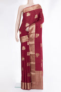 Maroon Mysore Crepe Saree with Zari Butta on the body and Zari Border.  displayed on a mannequin