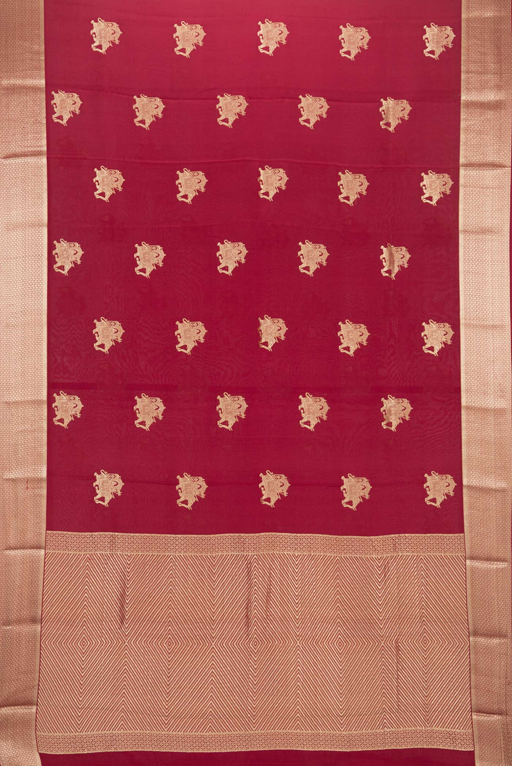 Flat view of Maroon Mysore Crepe Saree with Zari Butta on the body and Zari Border. 