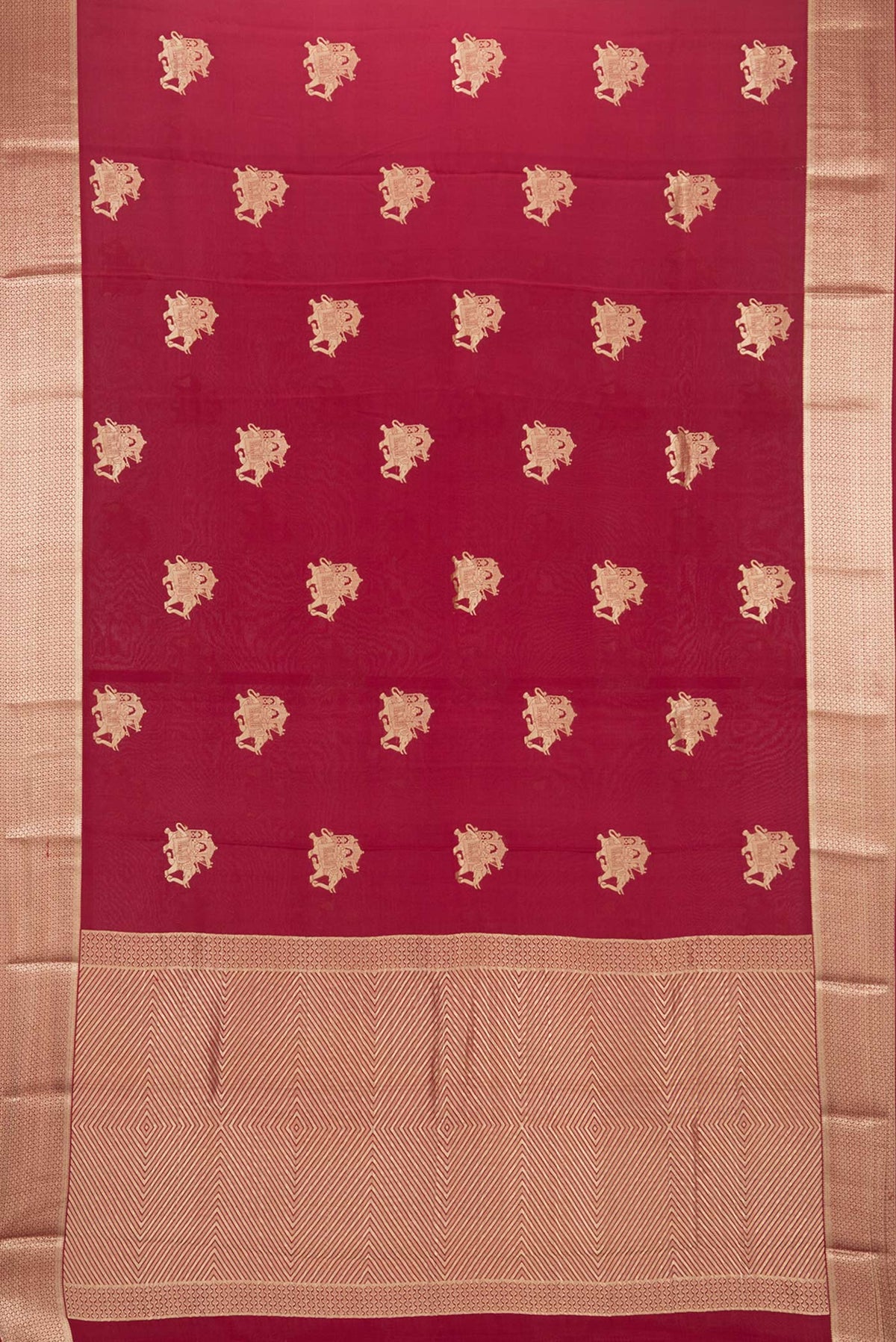 Flat view of Maroon Mysore Crepe Saree with Zari Butta on the body and Zari Border. 
