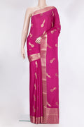 Dark Pink Mysore Crepe Saree with Zari Butta on the body and Fancy Border.  displayed on a mannequin