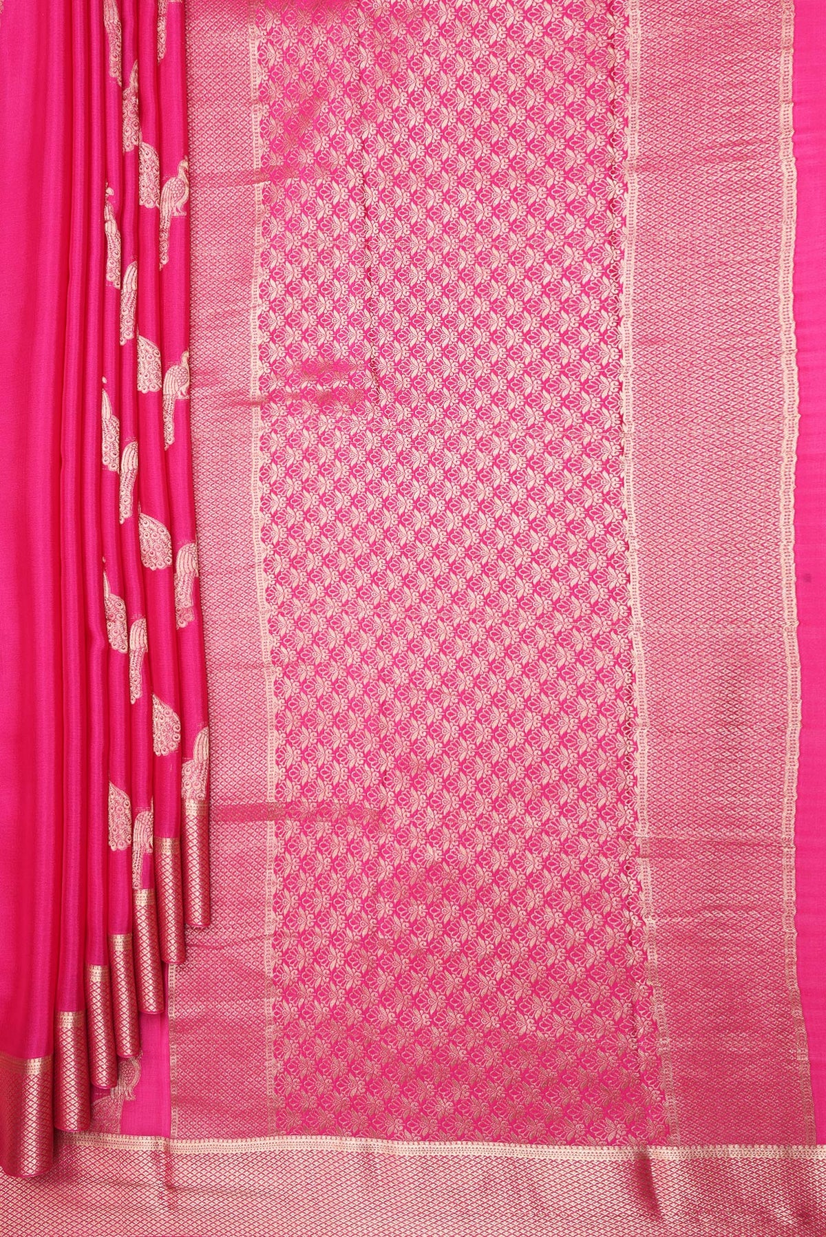 Pleats and pallu of Dark Pink Mysore Crepe Saree with Zari Butta on the body and Fancy Border. 