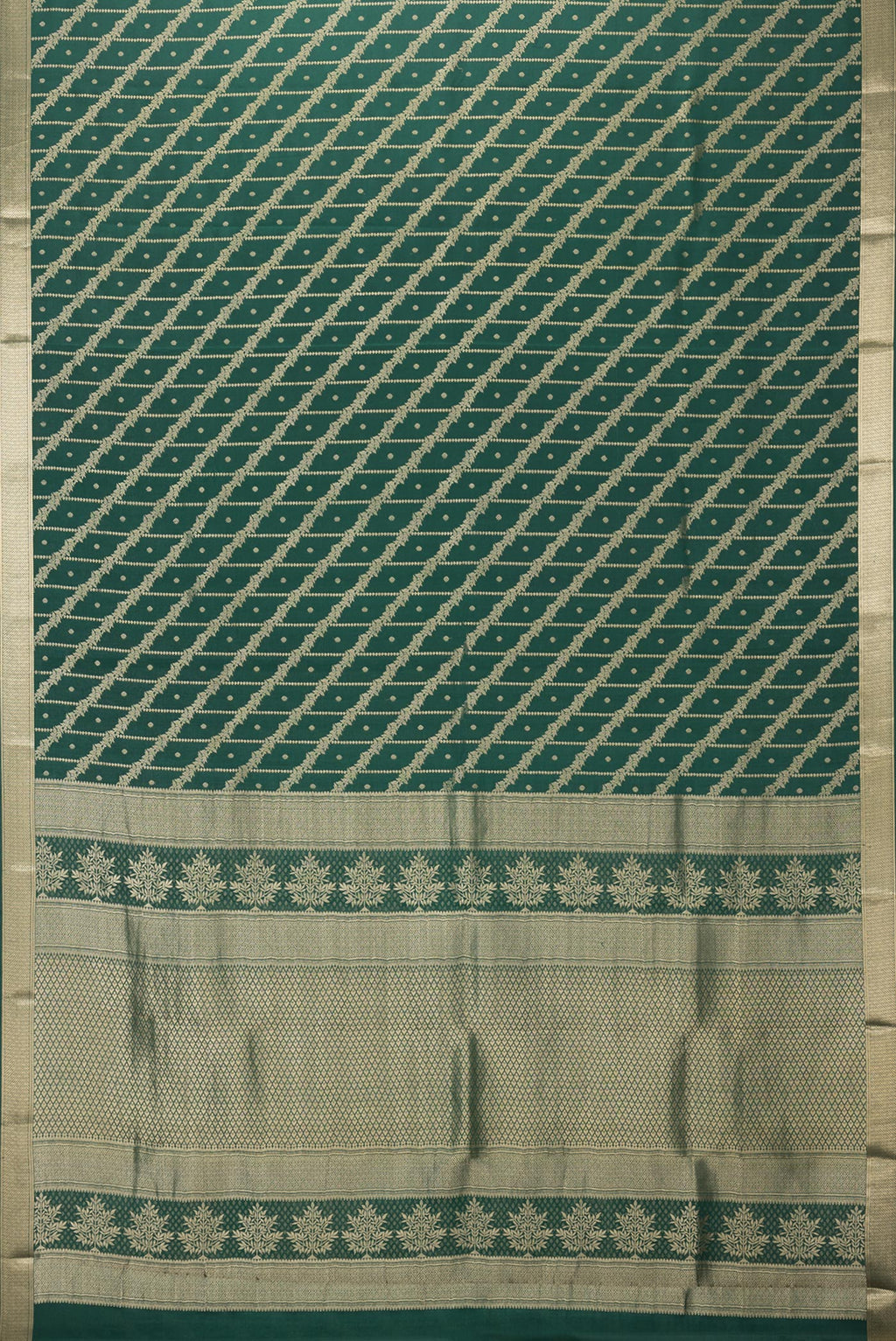 Flat view of Bottle Green Crepe Saree with Zari Brocade on the body and Zari Border. 